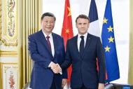 Xi, Macron hold talks in Paris